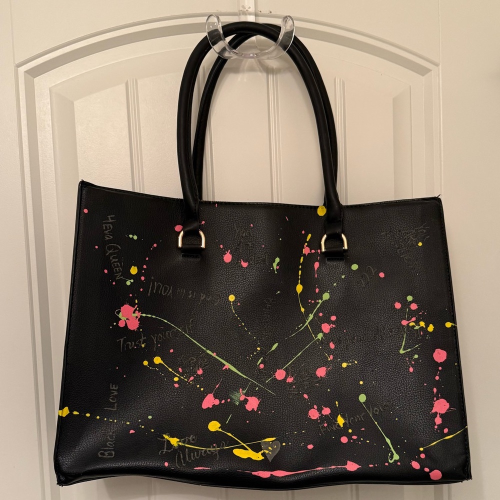 Black Office Handbag with Colorful Splatter Design.